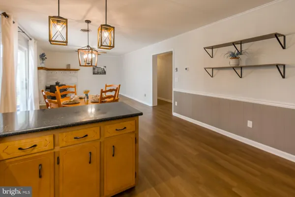 a kitchen with sink cabinets and appliances