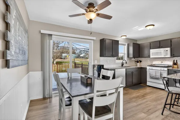 a kitchen with a sink cabinets and window
