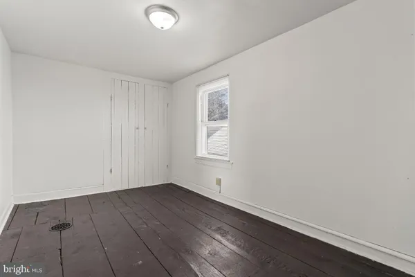 a view of a livingroom with wooden floor