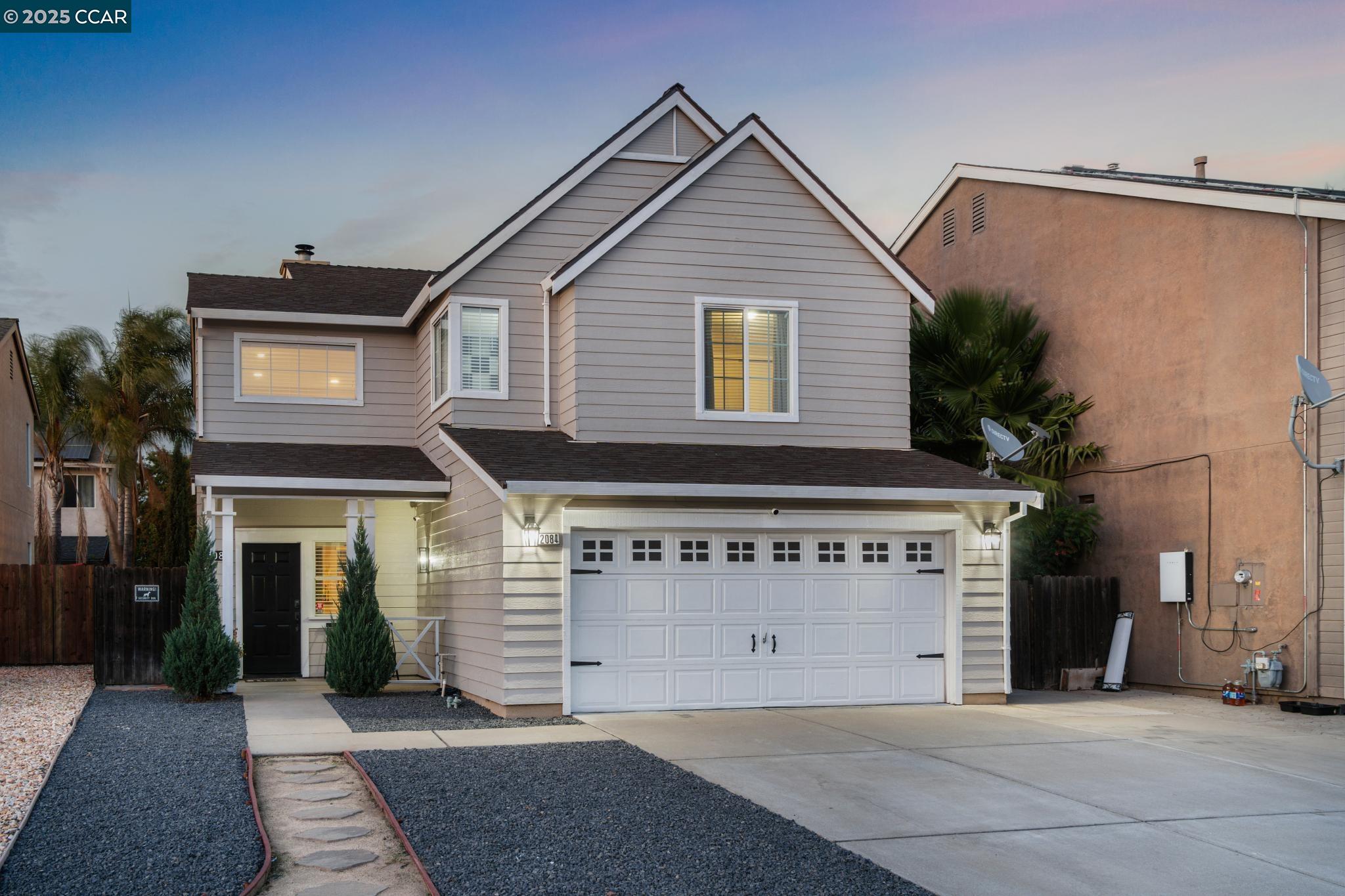 a view of a house with a garage