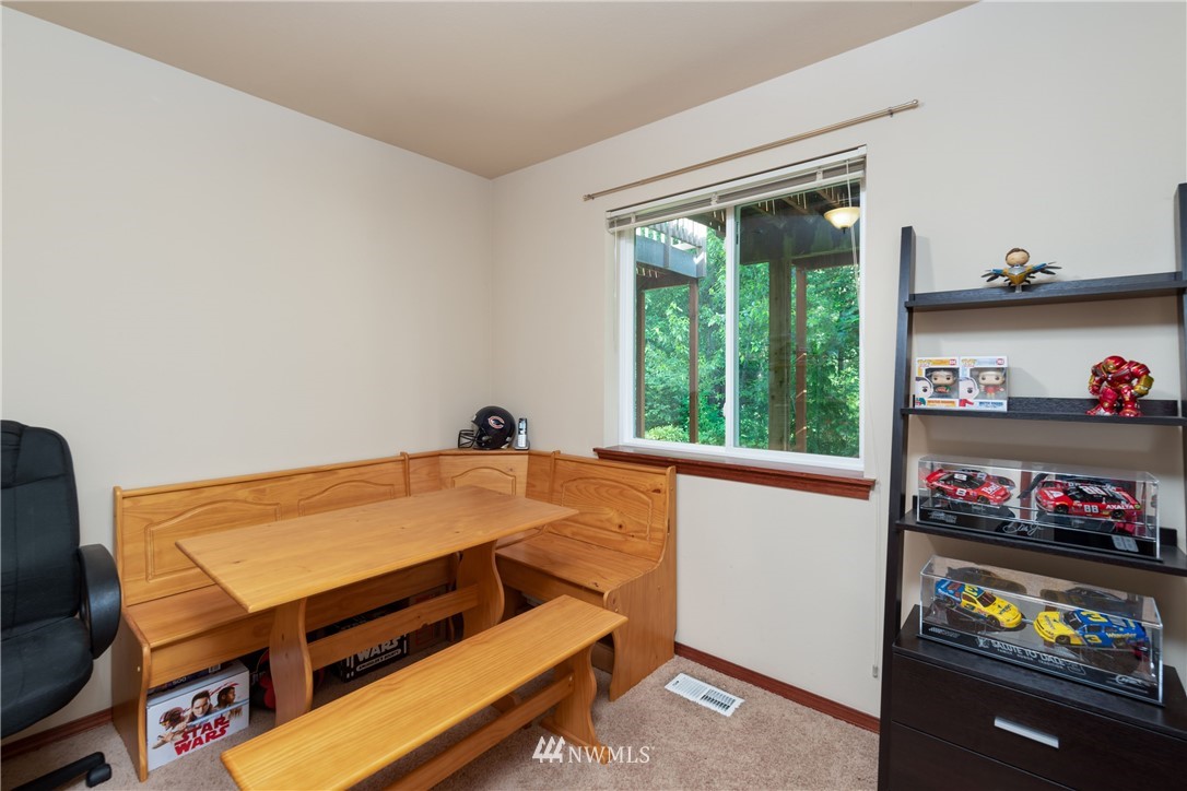 1057 215th Place Southeast Bothell, WA 98021 - Photo 22 of 26 a room with storage and utility