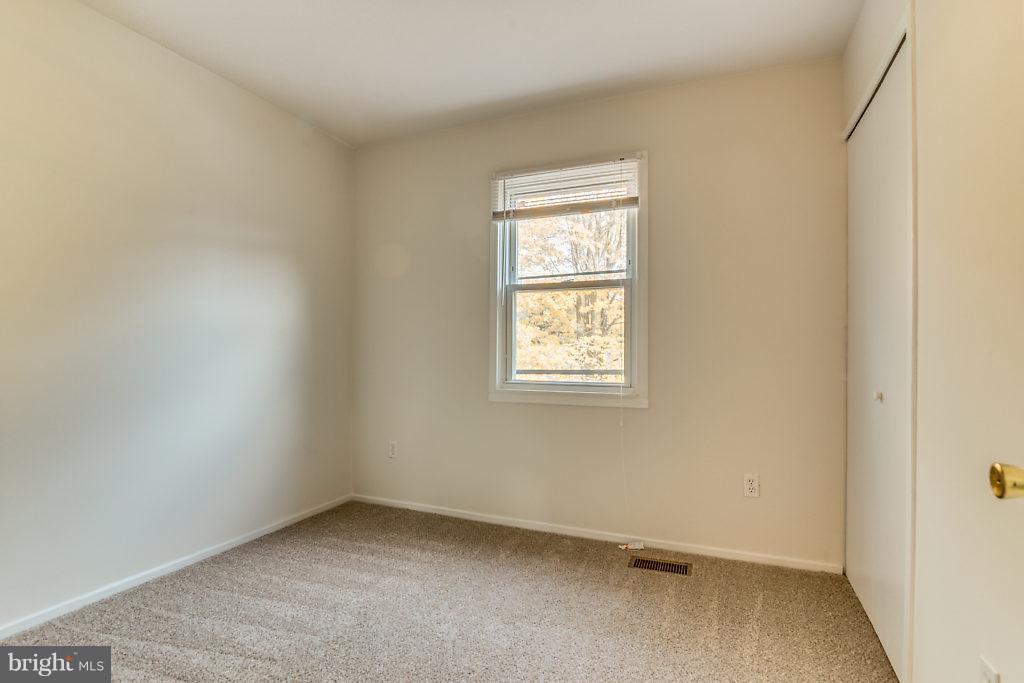 7732 Matisse Way Springfield, VA 22153 - Photo 16 of 30 an empty room with a window