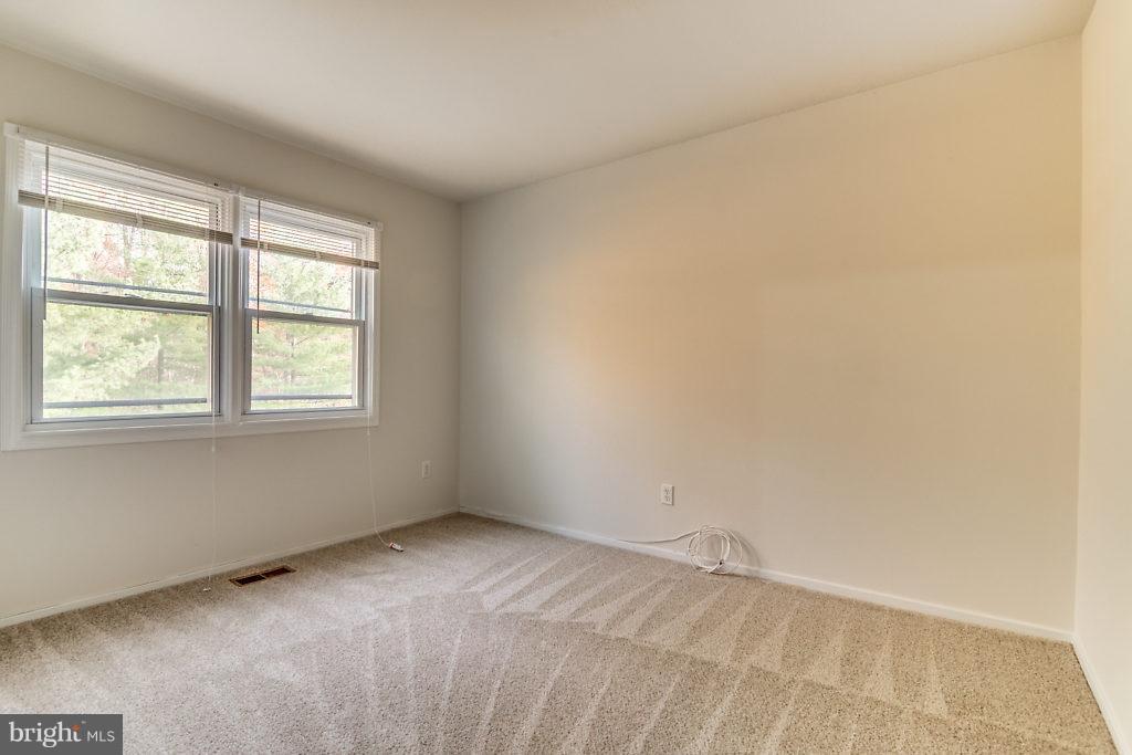7732 Matisse Way Springfield, VA 22153 - Photo 18 of 30 an empty room with a window