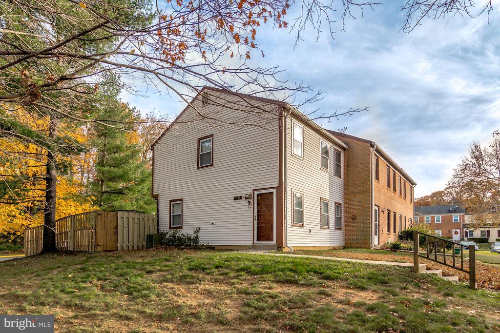 7732 Matisse Way Springfield, VA 22153 - Photo 2 of 30 a view of a house with a yard