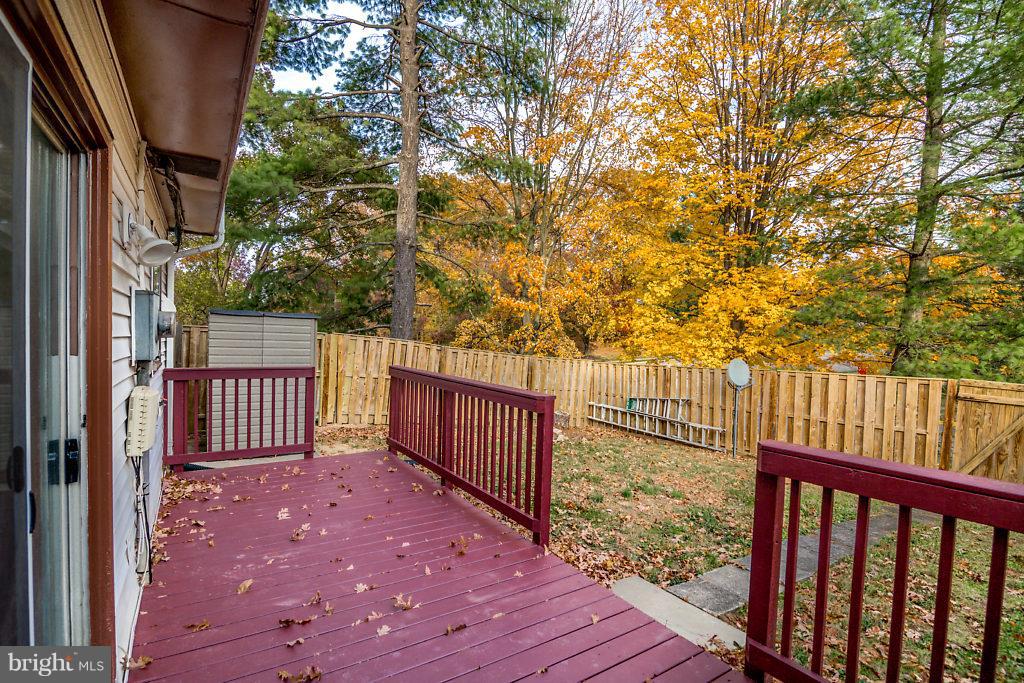 7732 Matisse Way Springfield, VA 22153 - Photo 28 of 30 a view of a balcony with wooden floor