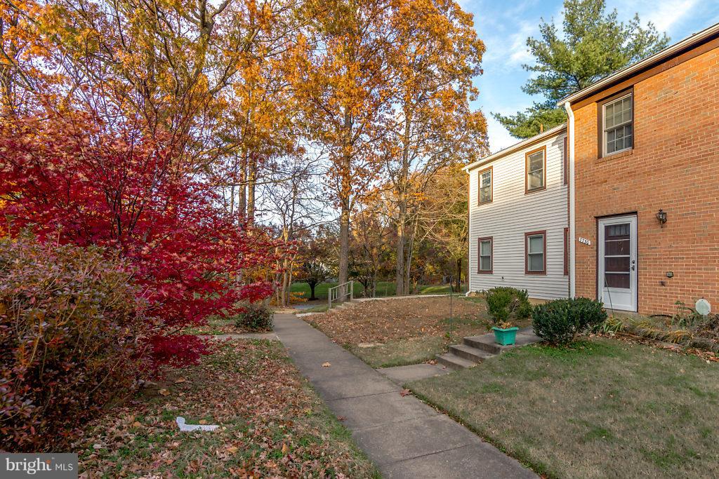 7732 Matisse Way Springfield, VA 22153 - Photo 3 of 30 a view of a house with a yard