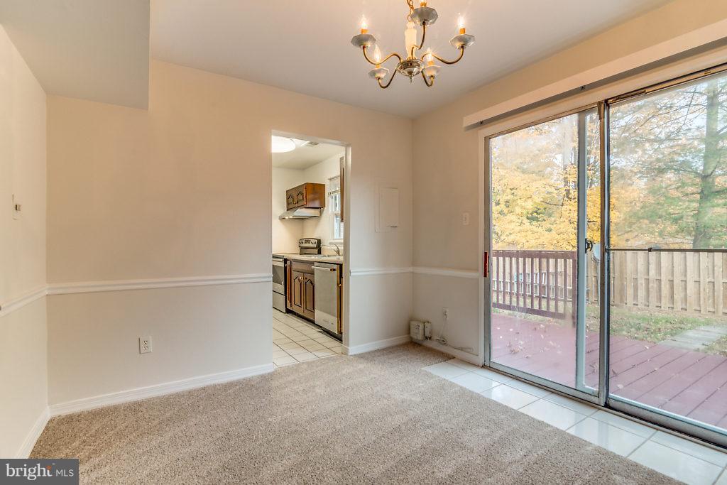 7732 Matisse Way Springfield, VA 22153 - Photo 10 of 30 an empty room with windows