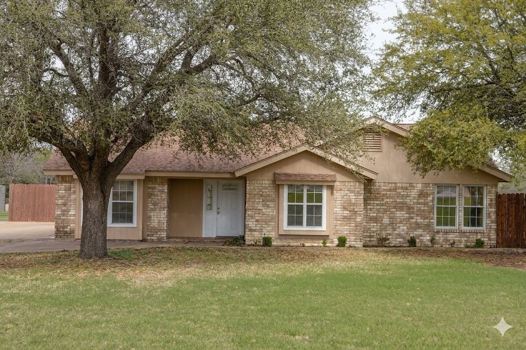 261 Rabbit Hill Lorena, TX 76655 - Photo 2 of 50 front view of a house with a yard