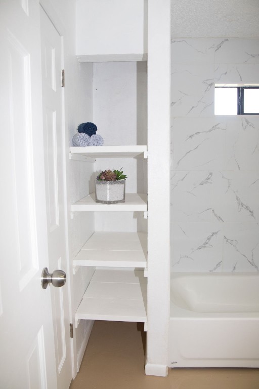 261 Rabbit Hill Lorena, TX 76655 - Photo 32 of 50 a bathroom with a bathtub