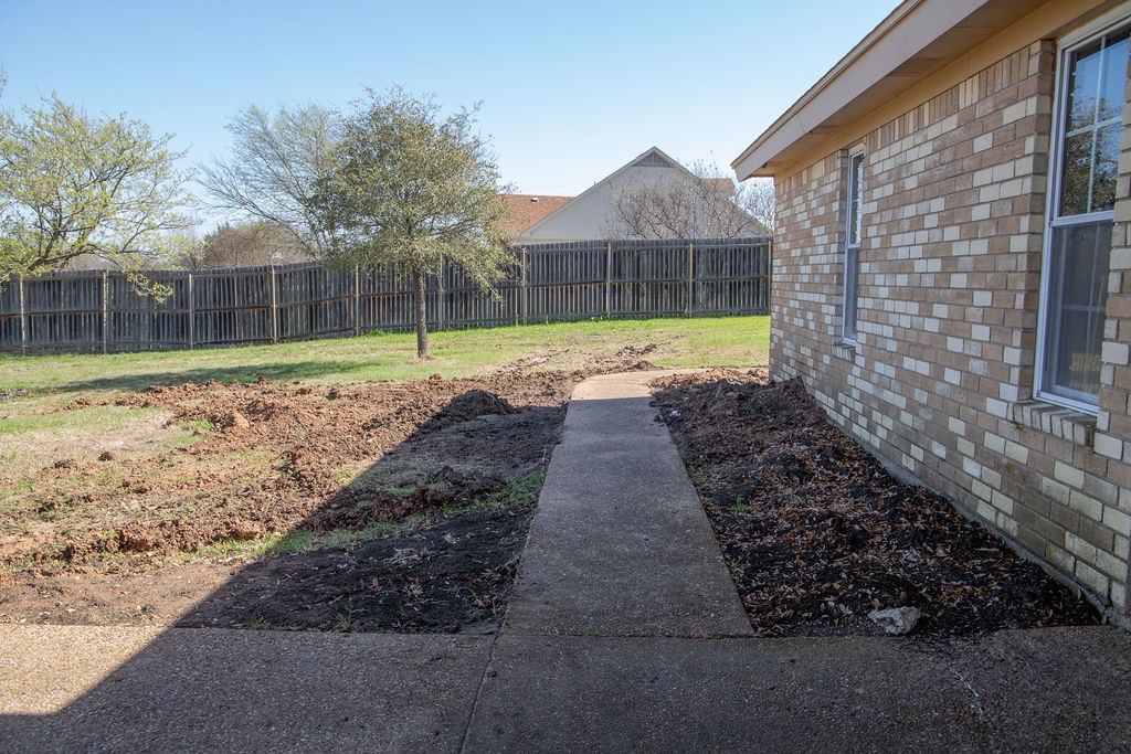 261 Rabbit Hill Lorena, TX 76655 - Photo 35 of 50 a view of a yard with a house