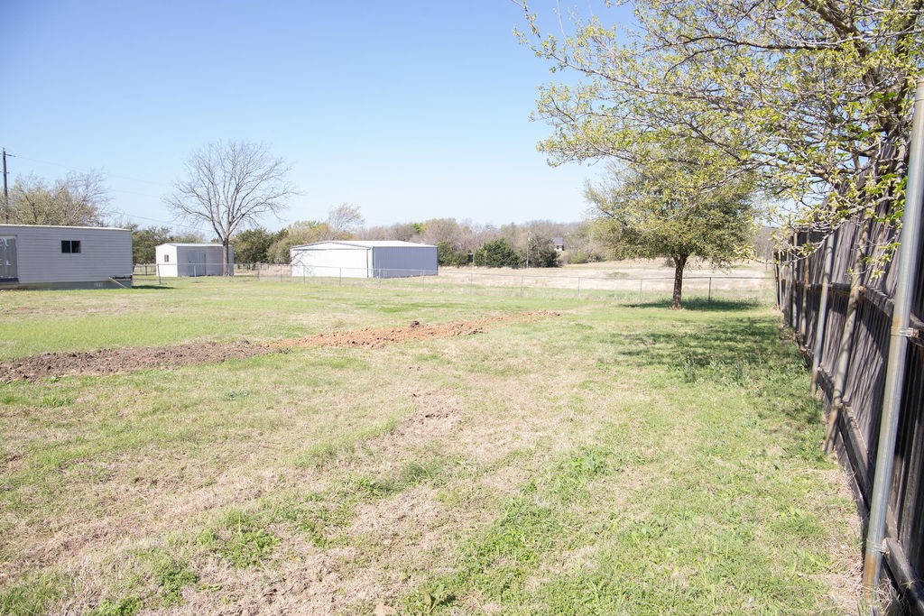 261 Rabbit Hill Lorena, TX 76655 - Photo 40 of 50 a big yard with tree s