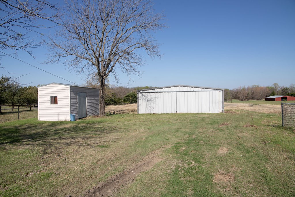 261 Rabbit Hill Lorena, TX 76655 - Photo 41 of 50 a big house with a big yard and large tree
