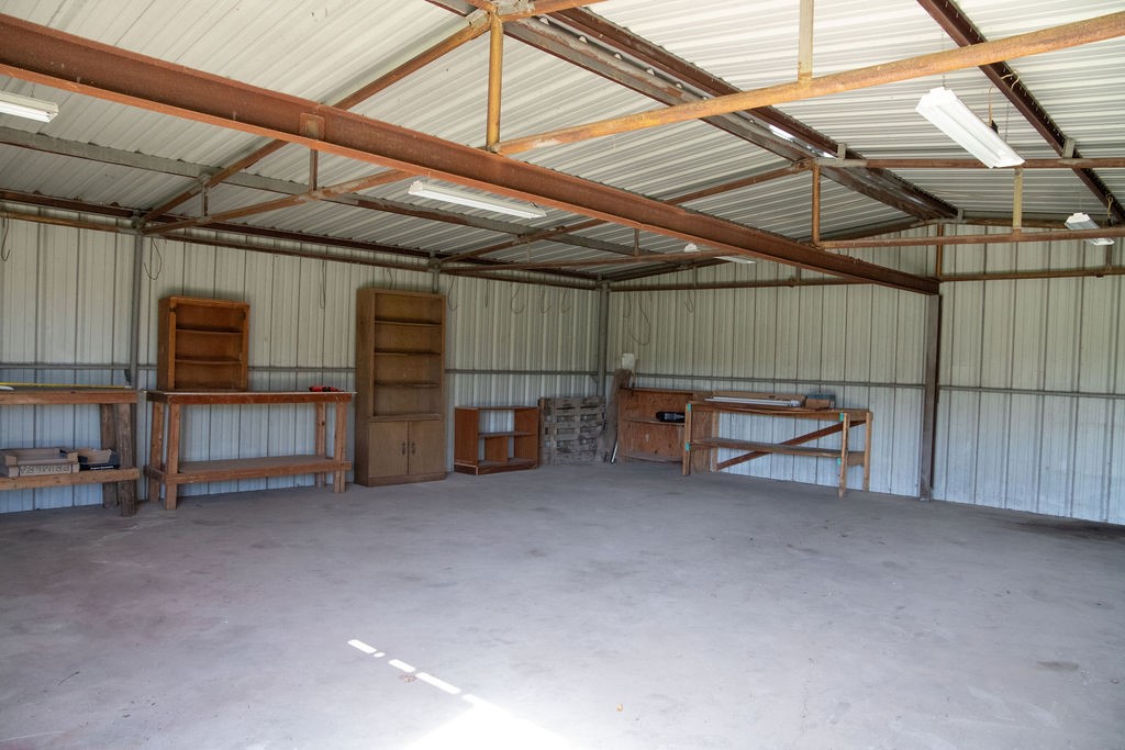 261 Rabbit Hill Lorena, TX 76655 - Photo 43 of 50 a view of a storage room with an empty space