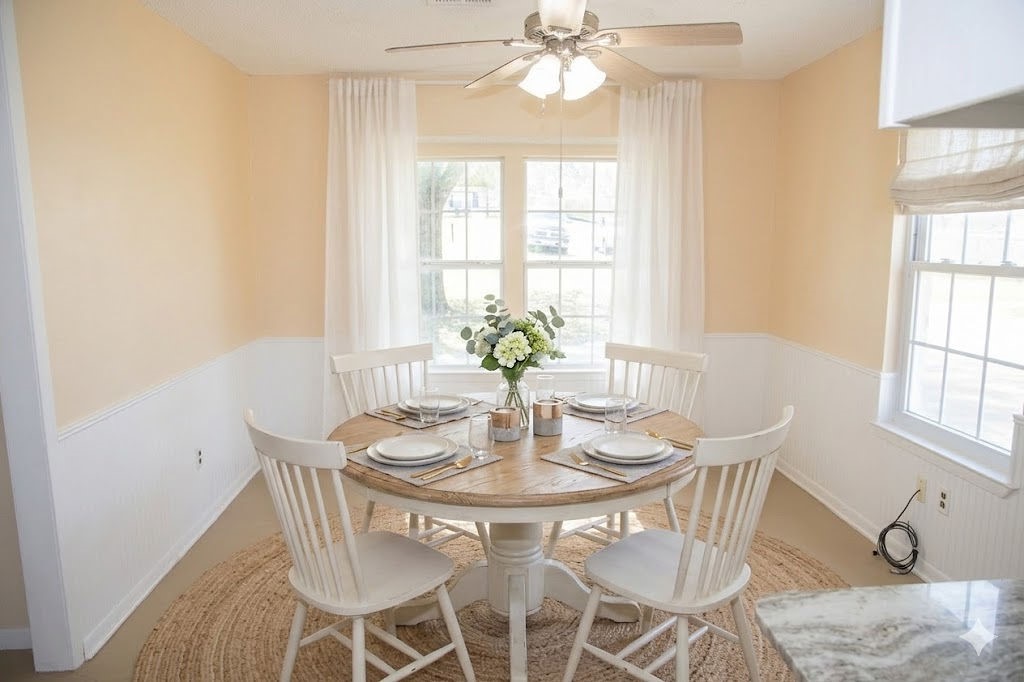 261 Rabbit Hill Lorena, TX 76655 - Photo 10 of 50 a dining room with furniture a chandelier and wooden floor