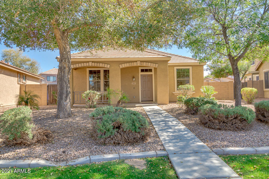 3763 East Larson Lane Gilbert, AZ 85295 - Photo 1 of 40 a front view of a house with garden