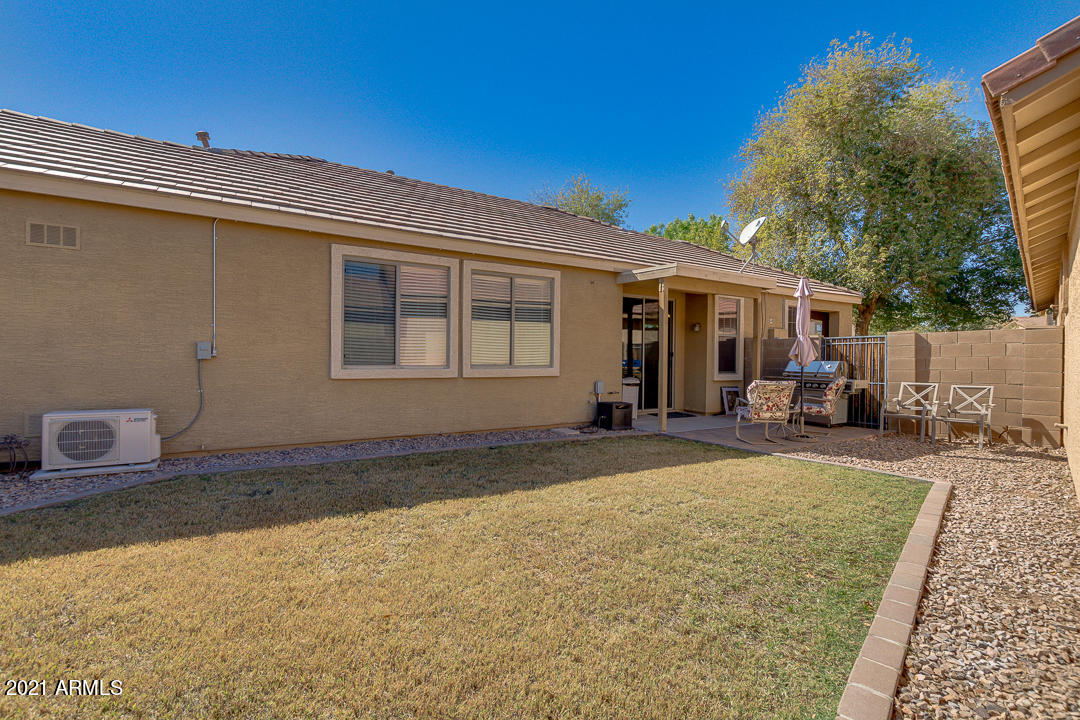 3763 East Larson Lane Gilbert, AZ 85295 - Photo 36 of 40 a view of a house with backyard and sitting area