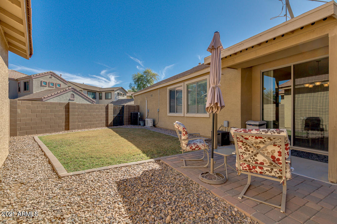 3763 East Larson Lane Gilbert, AZ 85295 - Photo 37 of 40 front view of a house with a patio