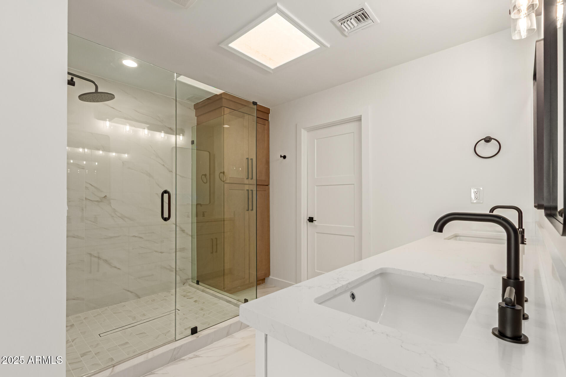 8883 East Fairway Boulevard Sun Lakes, AZ 85248 - Photo 13 of 30 a bathroom with a shower and a sink