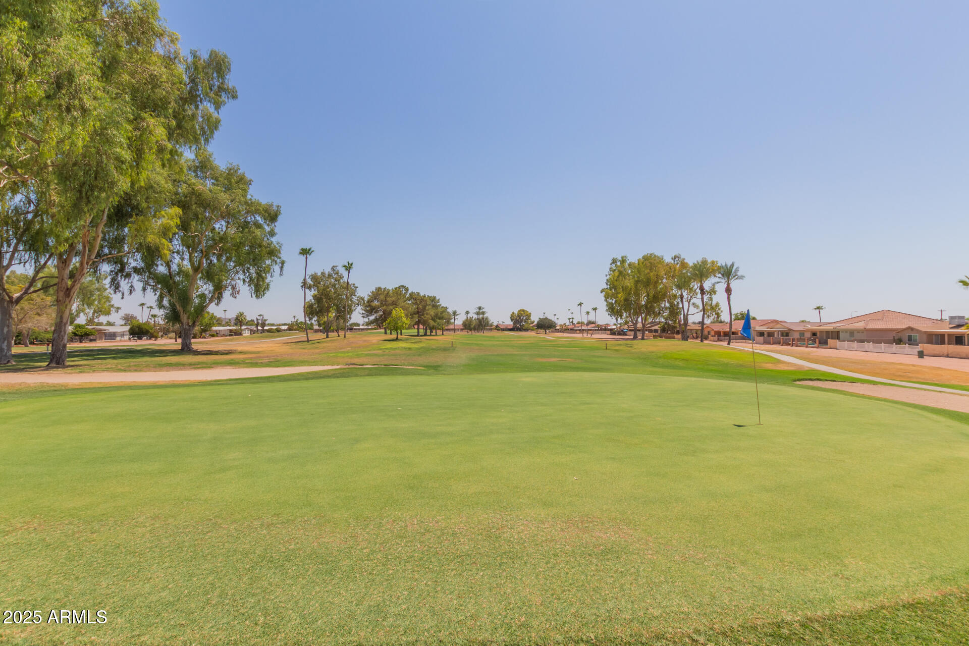8883 East Fairway Boulevard Sun Lakes, AZ 85248 - Photo 23 of 30 a view of an ocean and beach