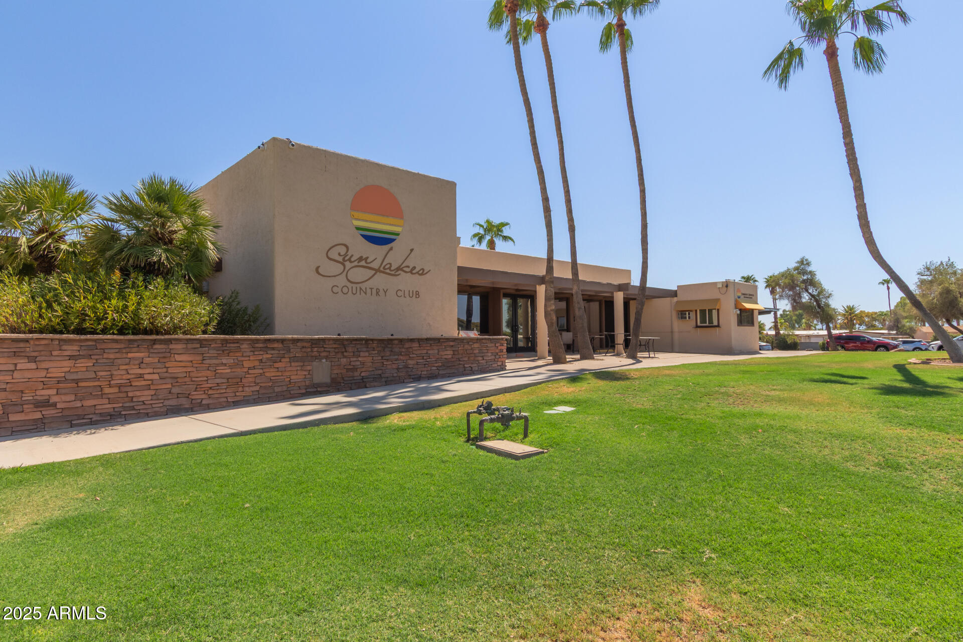 8883 East Fairway Boulevard Sun Lakes, AZ 85248 - Photo 25 of 30 a view of a house with a swimming pool