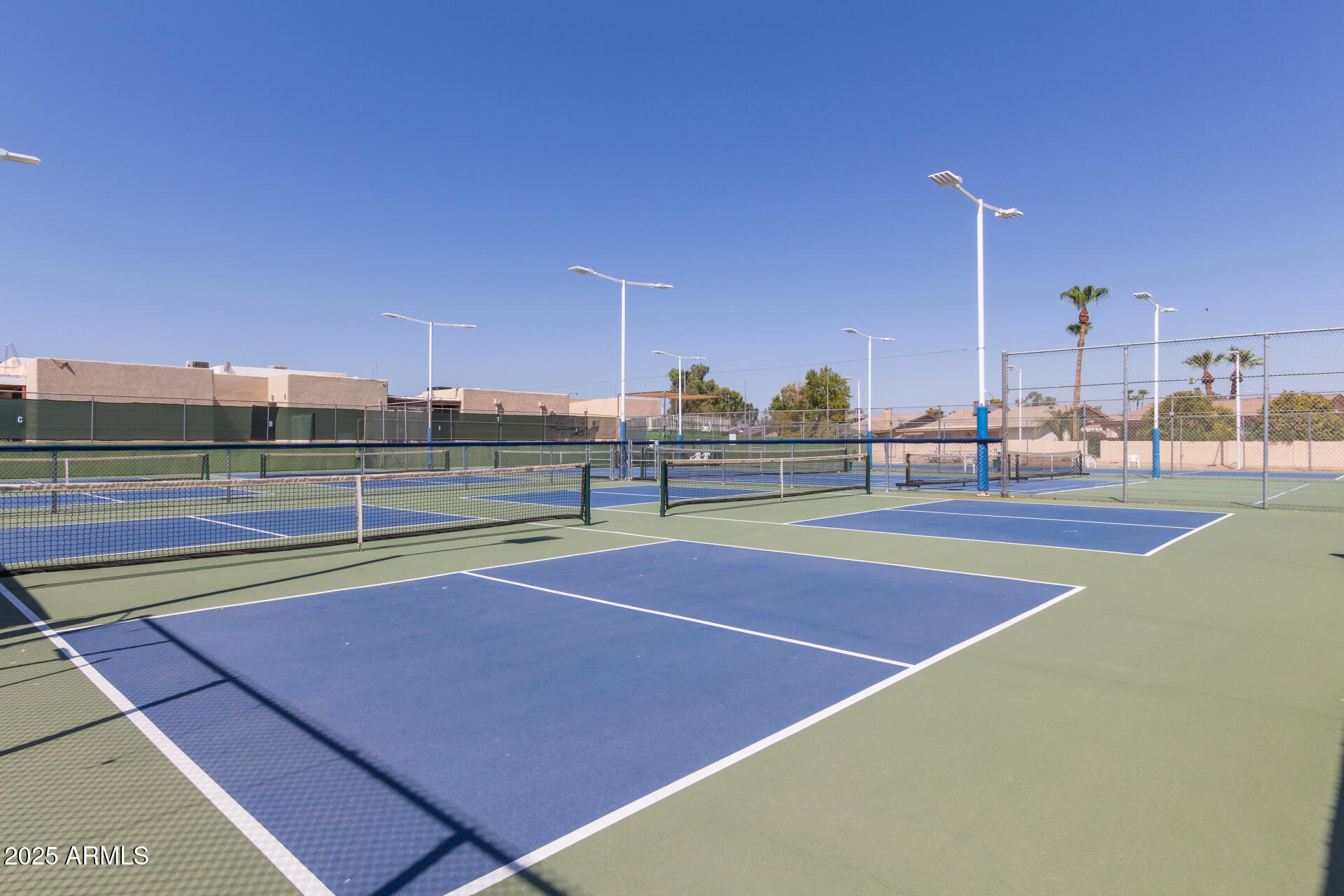 8883 East Fairway Boulevard Sun Lakes, AZ 85248 - Photo 30 of 30 a view of an outdoor space and tennis court