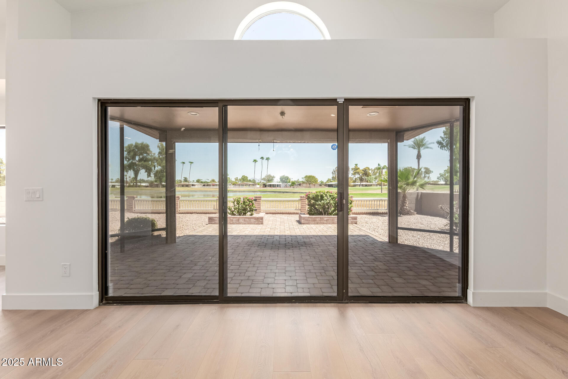 8883 East Fairway Boulevard Sun Lakes, AZ 85248 - Photo 9 of 30 an entryway with livingroom view