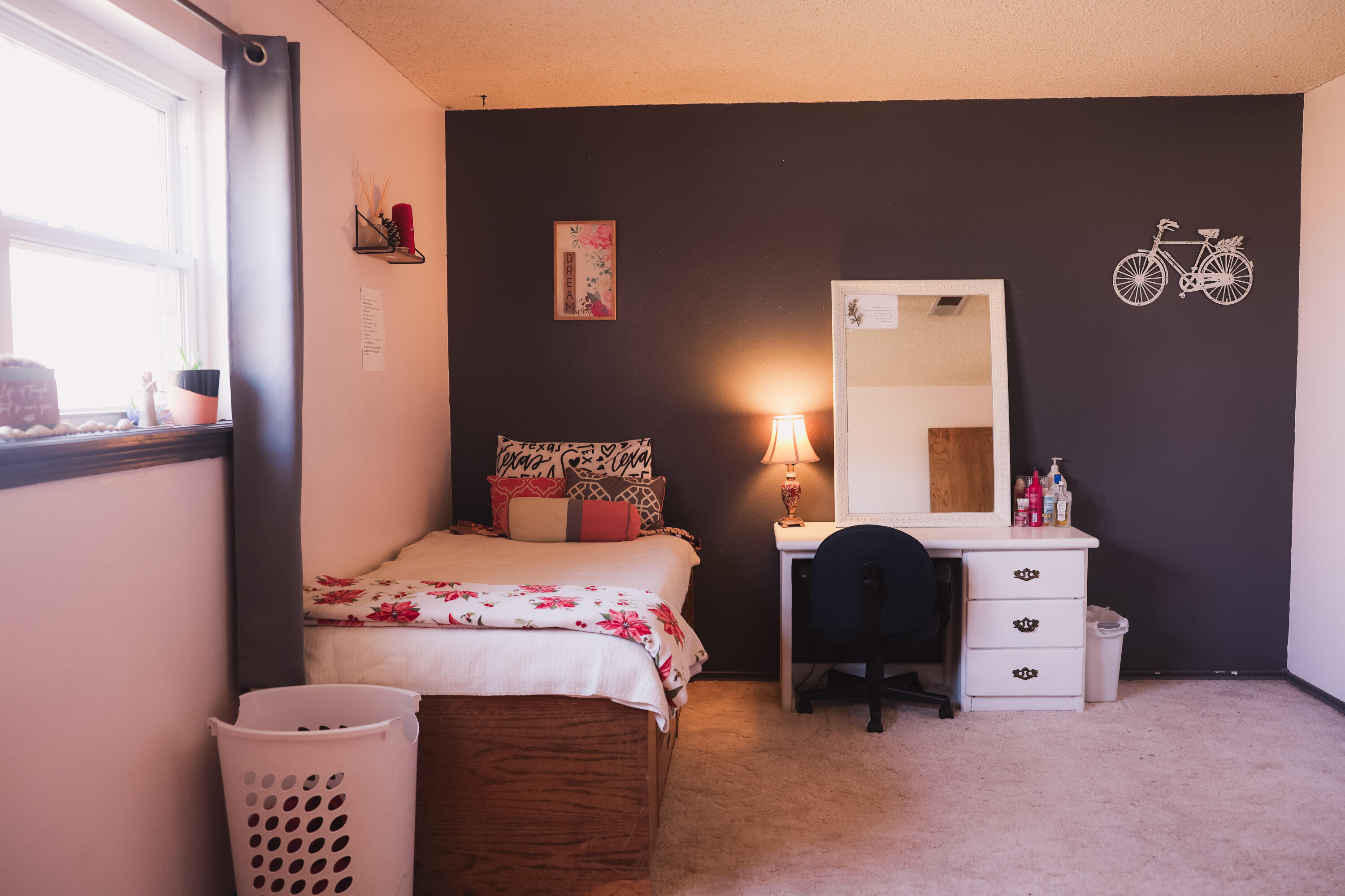 660 County Road K Plainview, TX 79072 - Photo 22 of 66 a bedroom with a bed and a couch