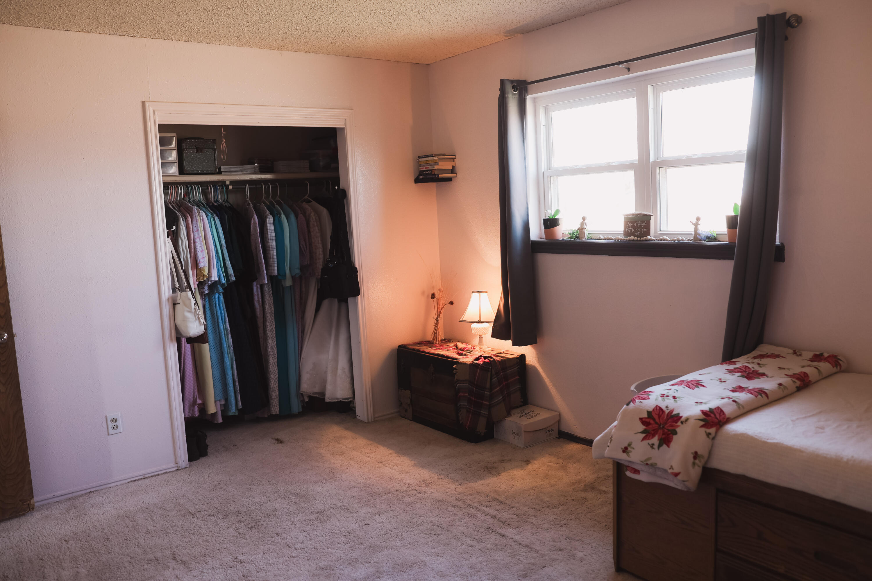 660 County Road K Plainview, TX 79072 - Photo 23 of 66 a bedroom with a bed and a window