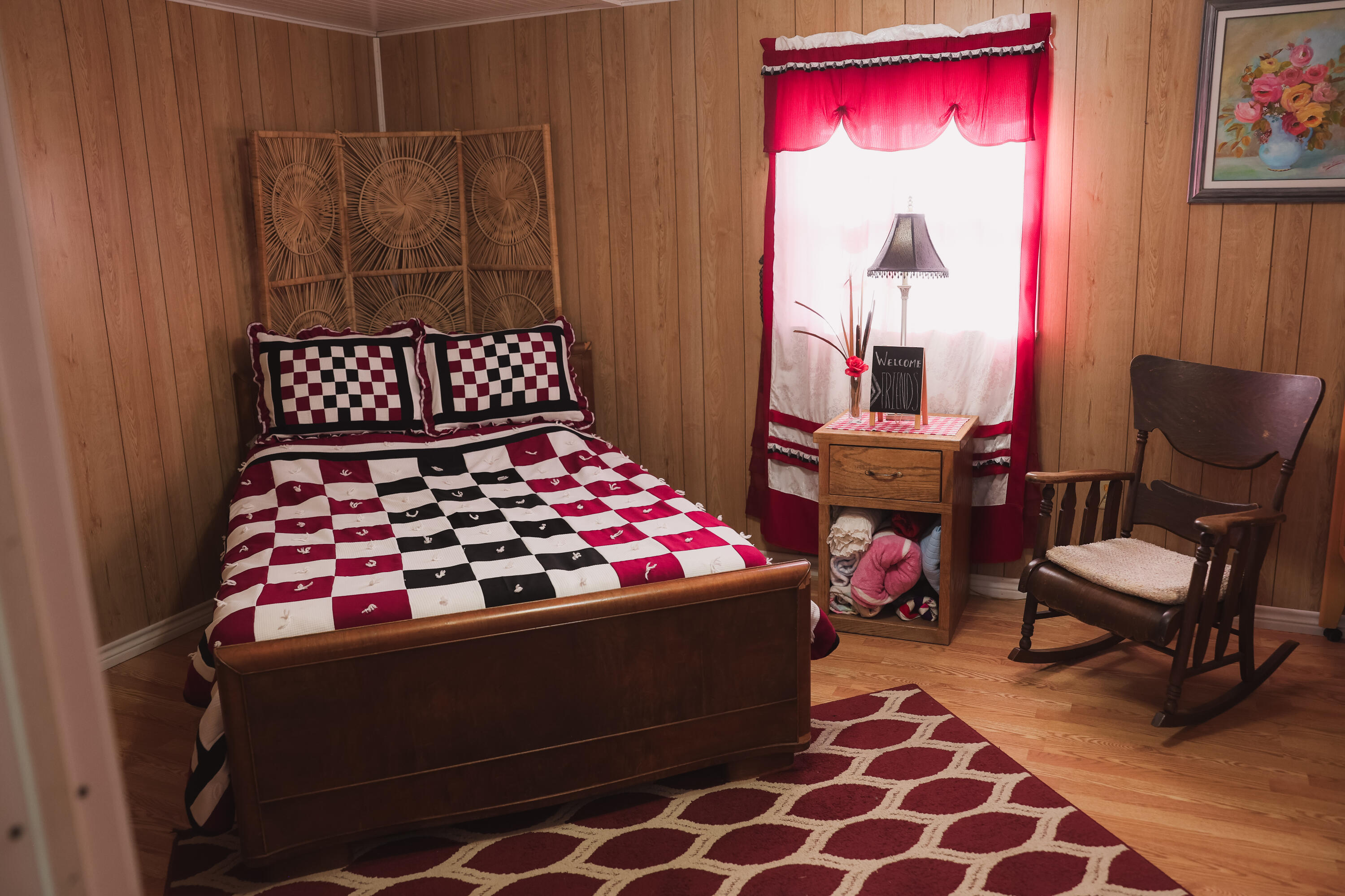 660 County Road K Plainview, TX 79072 - Photo 36 of 66 a bedroom with a bed and wooden floor