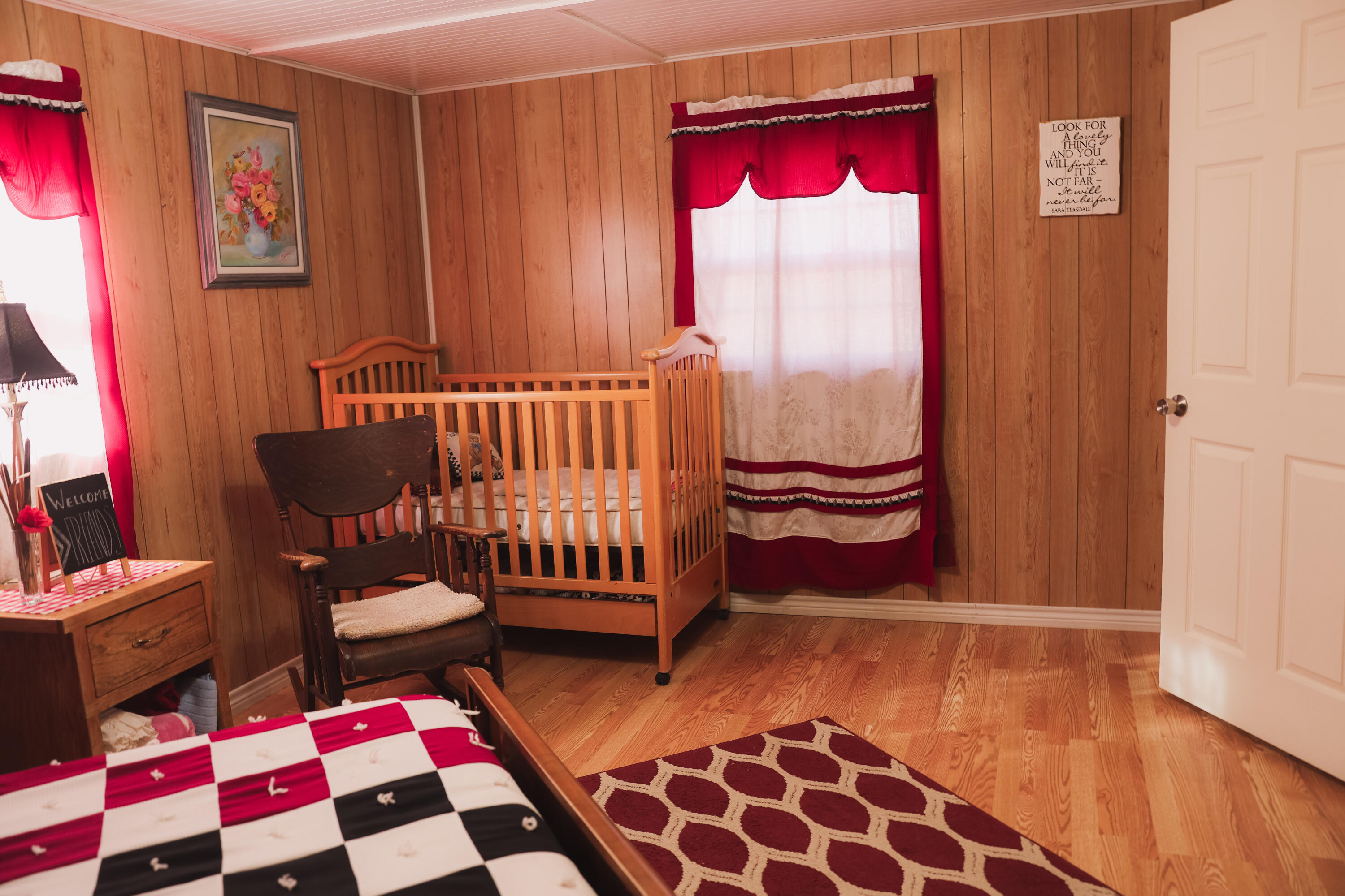 660 County Road K Plainview, TX 79072 - Photo 37 of 66 a bedroom with furniture and a window