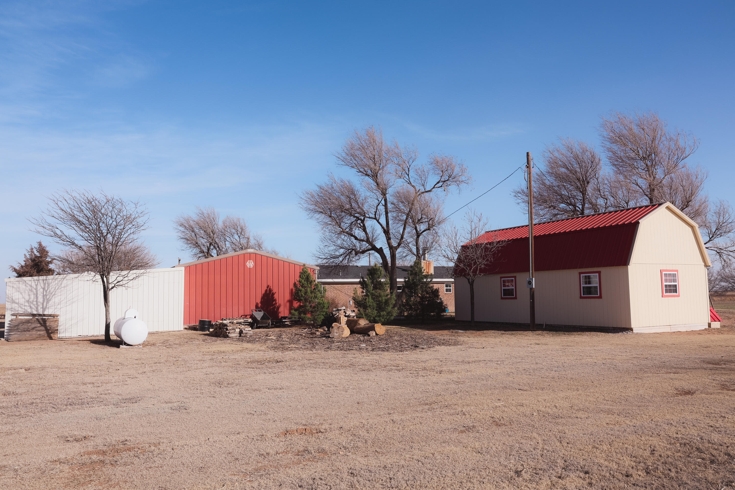 660 County Road K Plainview, TX 79072 - Photo 47 of 66 a view of large house with a yard