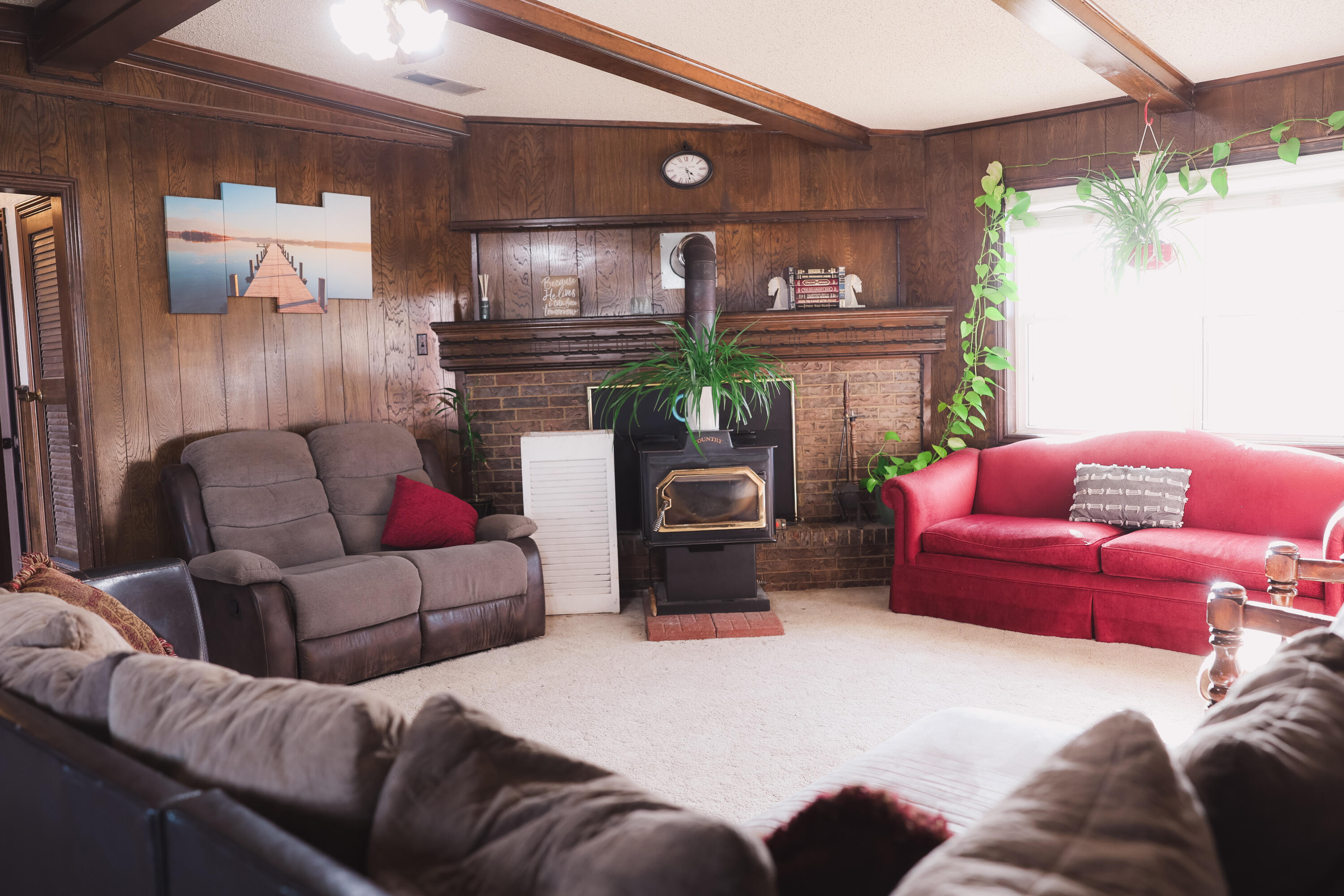 660 County Road K Plainview, TX 79072 - Photo 7 of 66 a living room with furniture and a fireplace