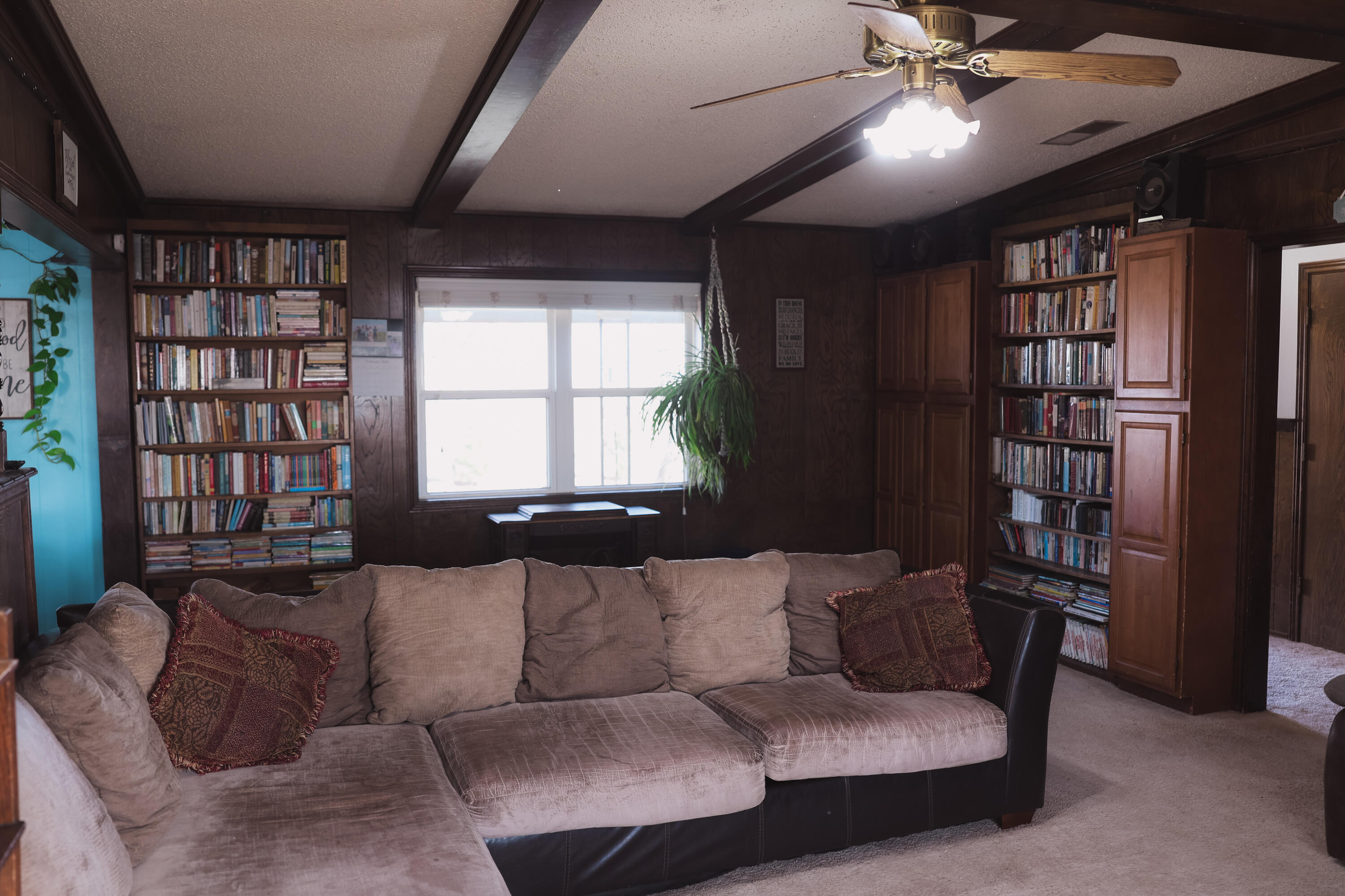 660 County Road K Plainview, TX 79072 - Photo 9 of 66 a living room with furniture and a large window
