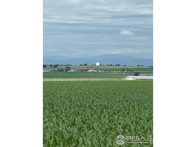 a view of an ocean and mountain