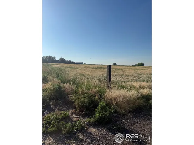 a view of a lake from a hallway