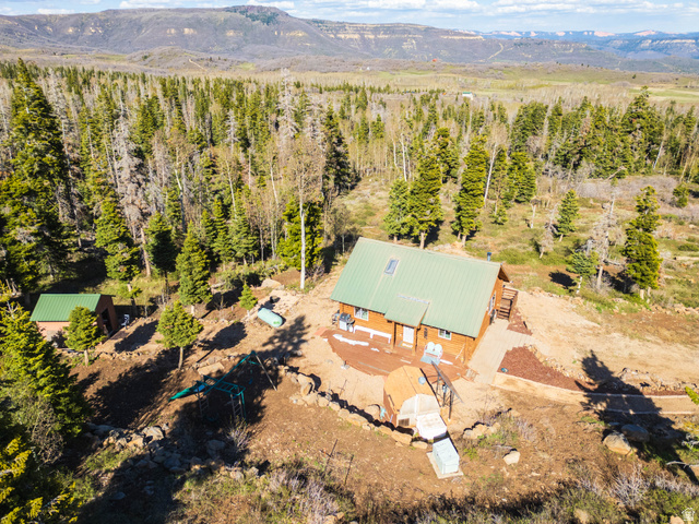 706 Tranquility Drive Springdale, UT 84767 - Photo 55 of 55 The Ultimate Getaway: Looking down at the cabin nestled safely in the mountain pines.
