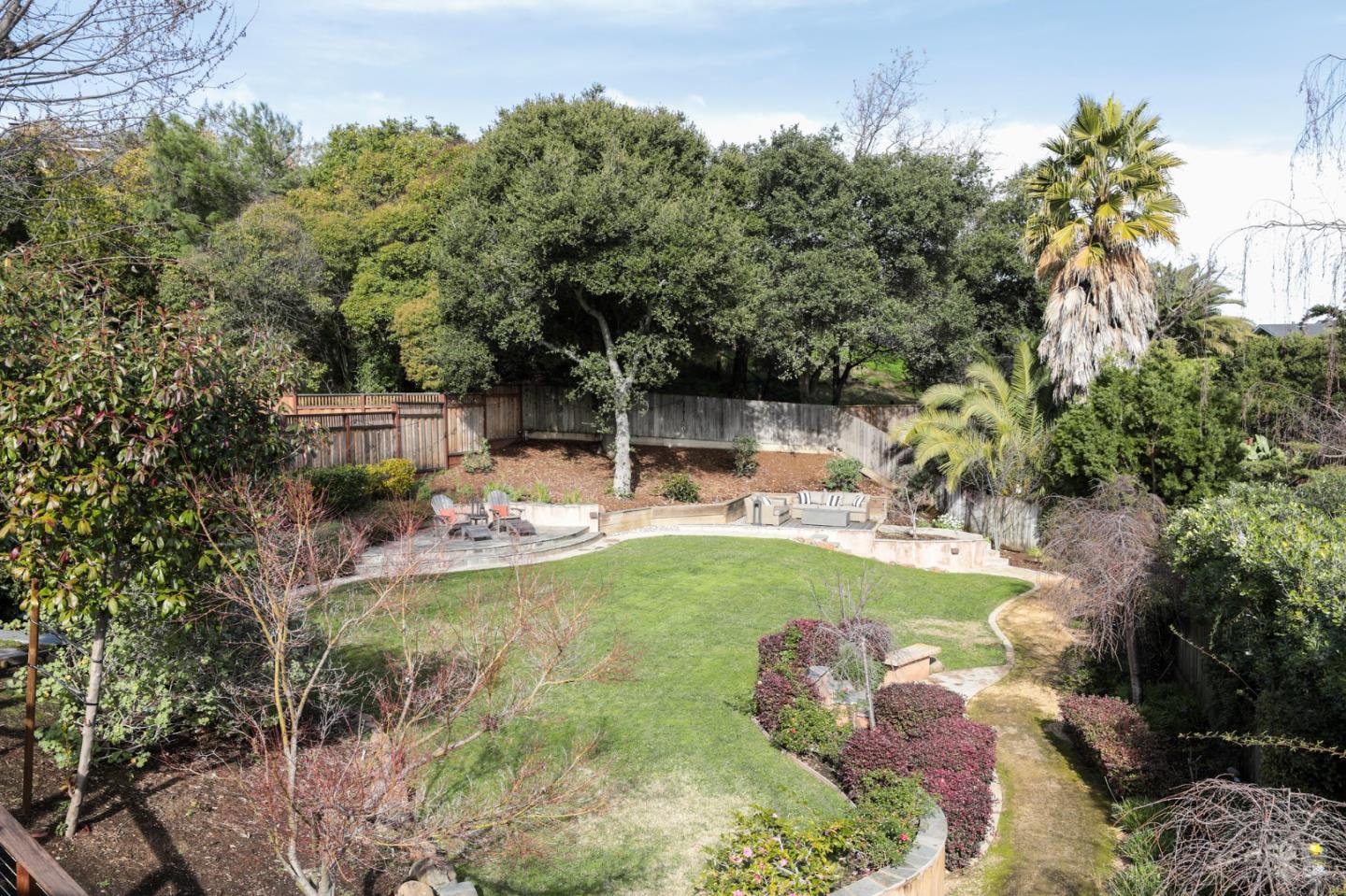 2432 Melendy Drive San Carlos, CA 94070 - Photo 2 of 3 a view of a swimming pool with a patio