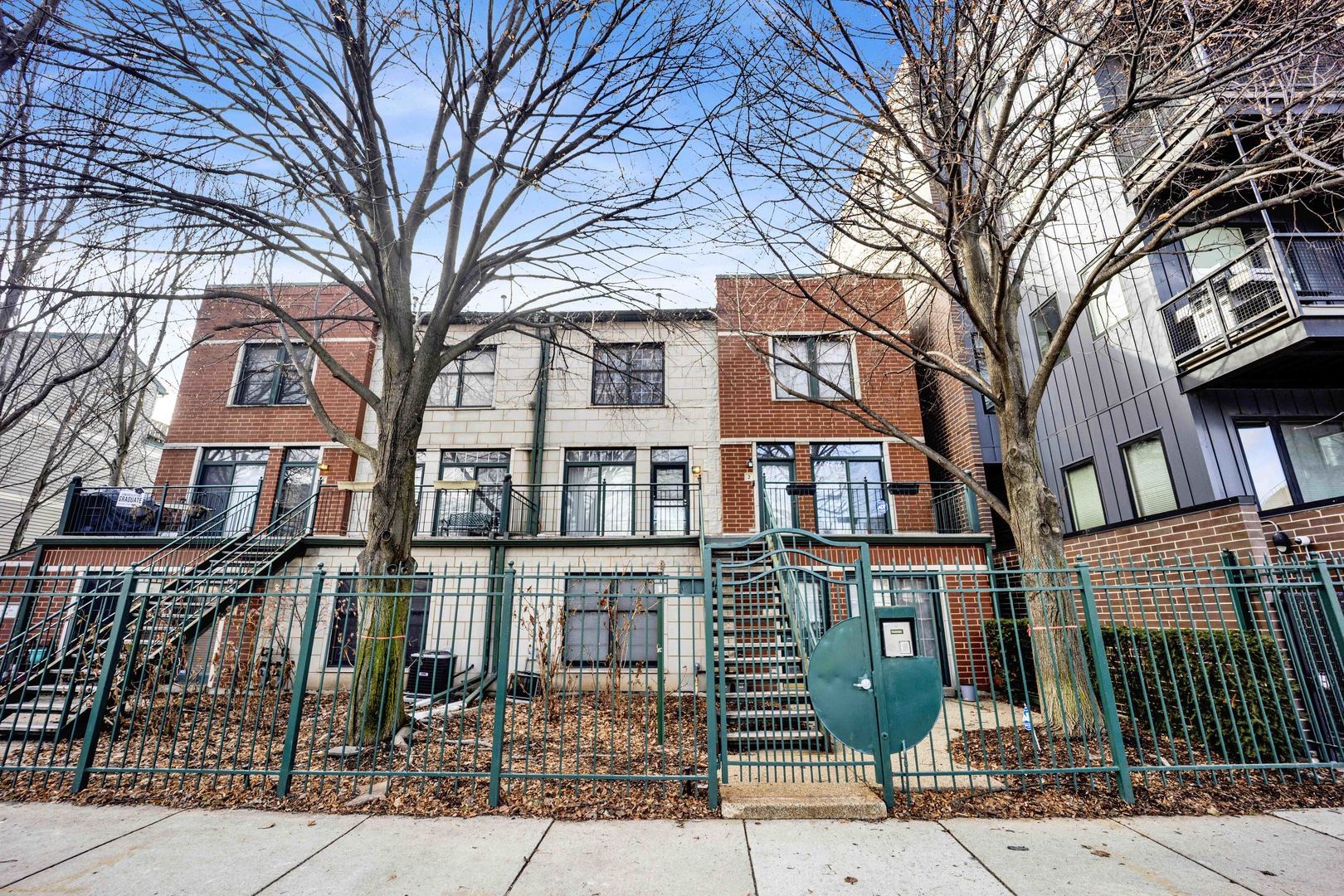 front view of a building with a street