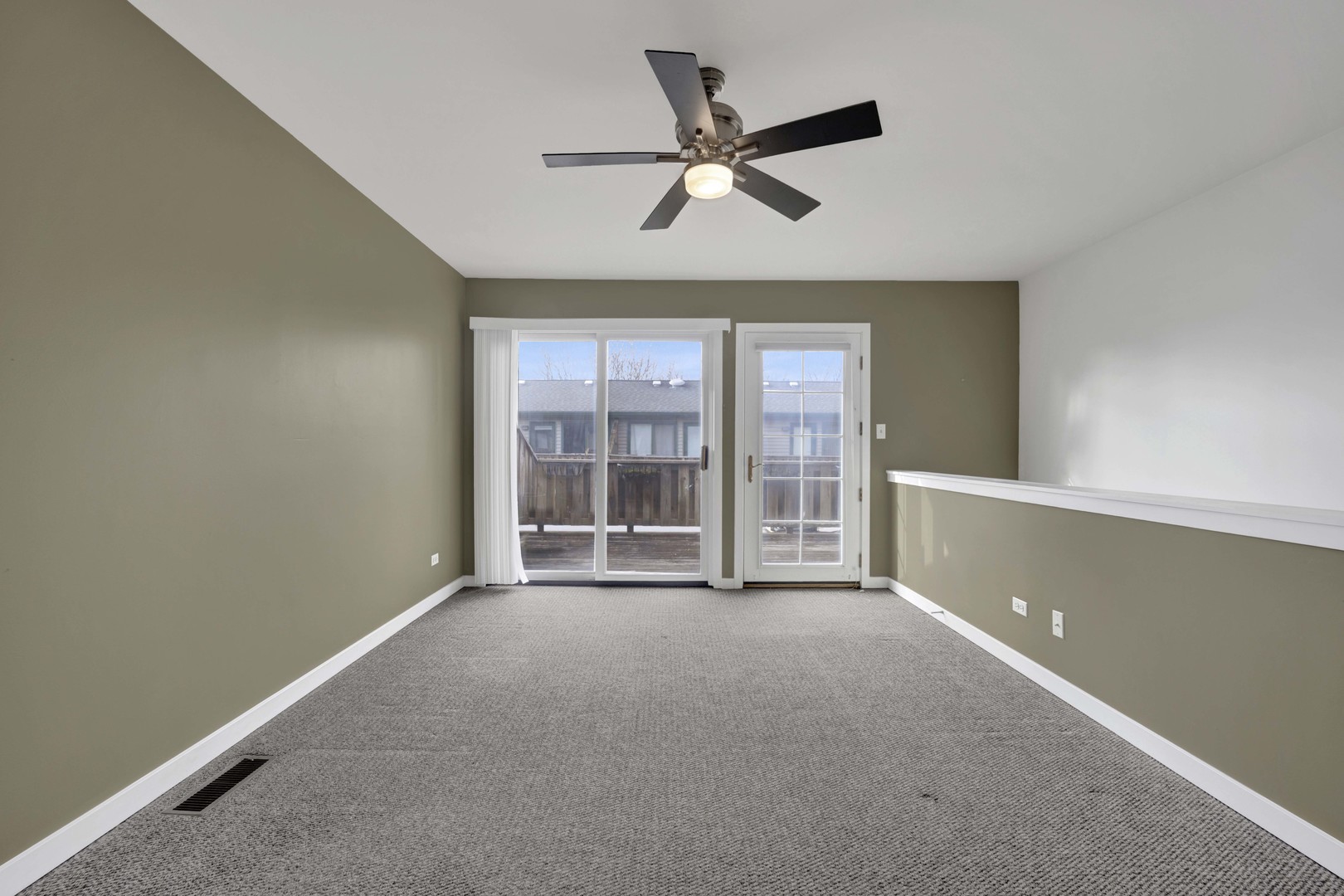 1812 South State Street, Unit 3 Chicago, IL 60616 - Photo 21 of 29 an empty room with ceiling fan and windows