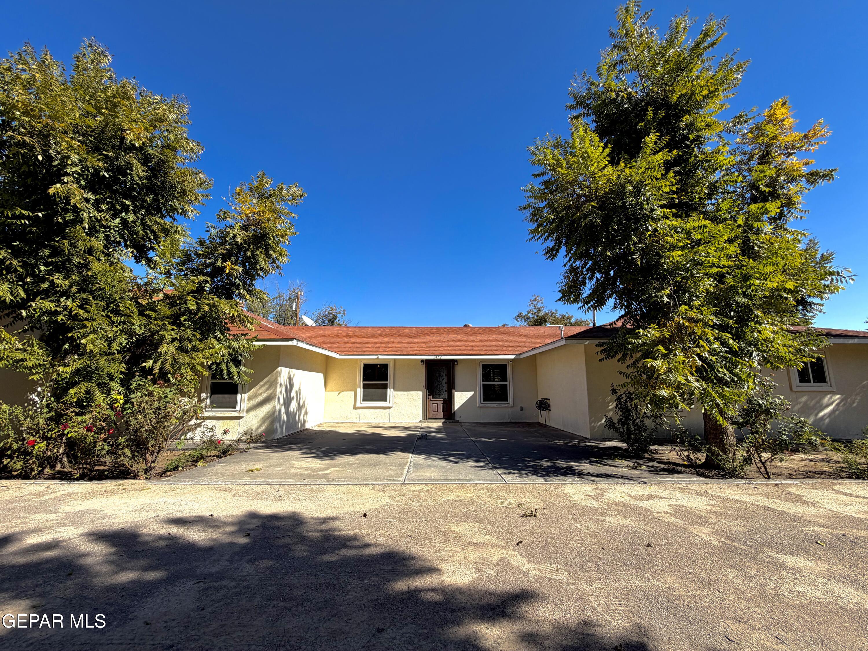 a house view with a outdoor space