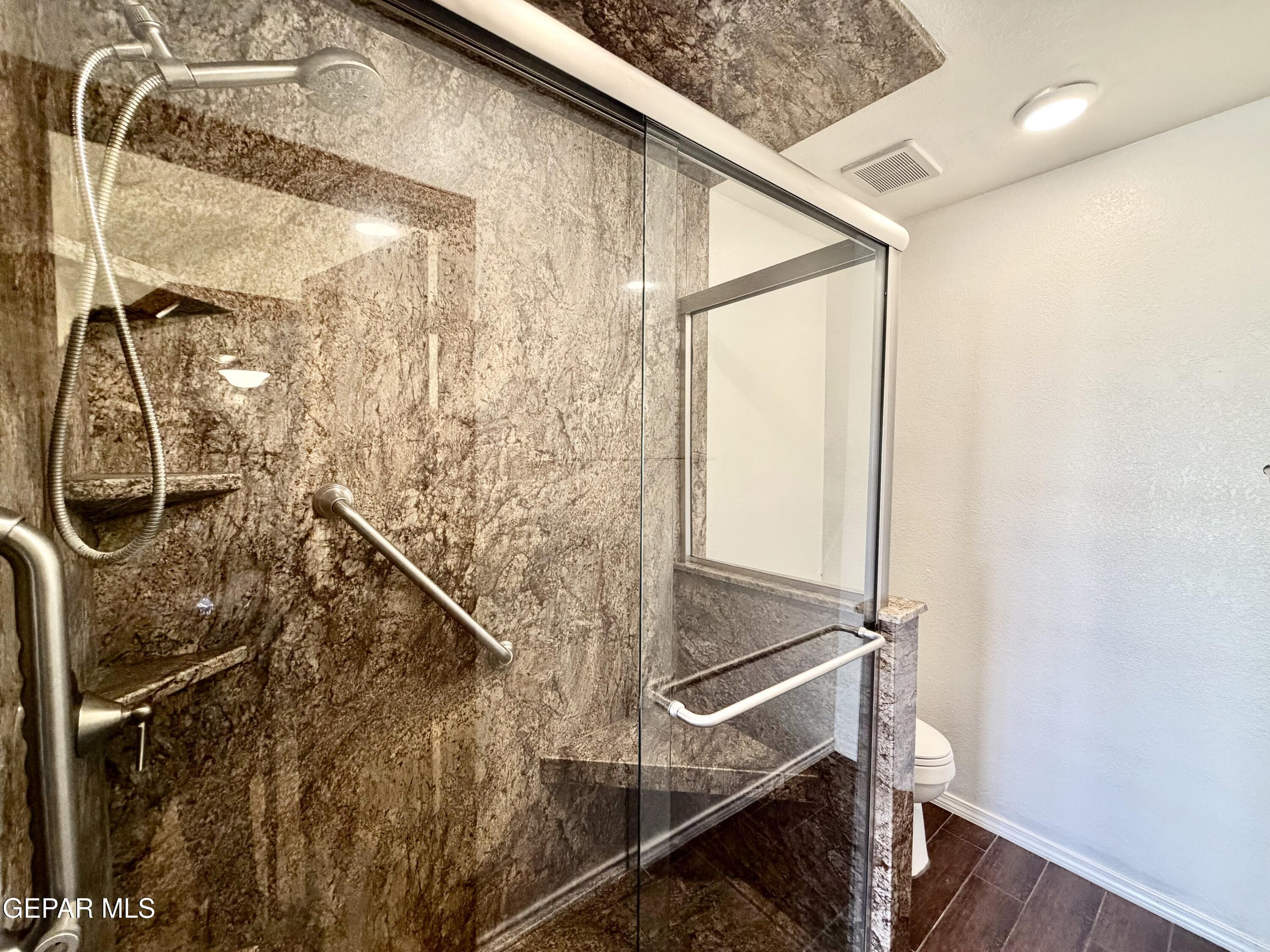 2452 West Ohara Road Anthony, NM 88021 - Photo 20 of 56 a bathroom with a shower and a sink