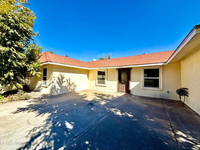 a view of a house with a patio