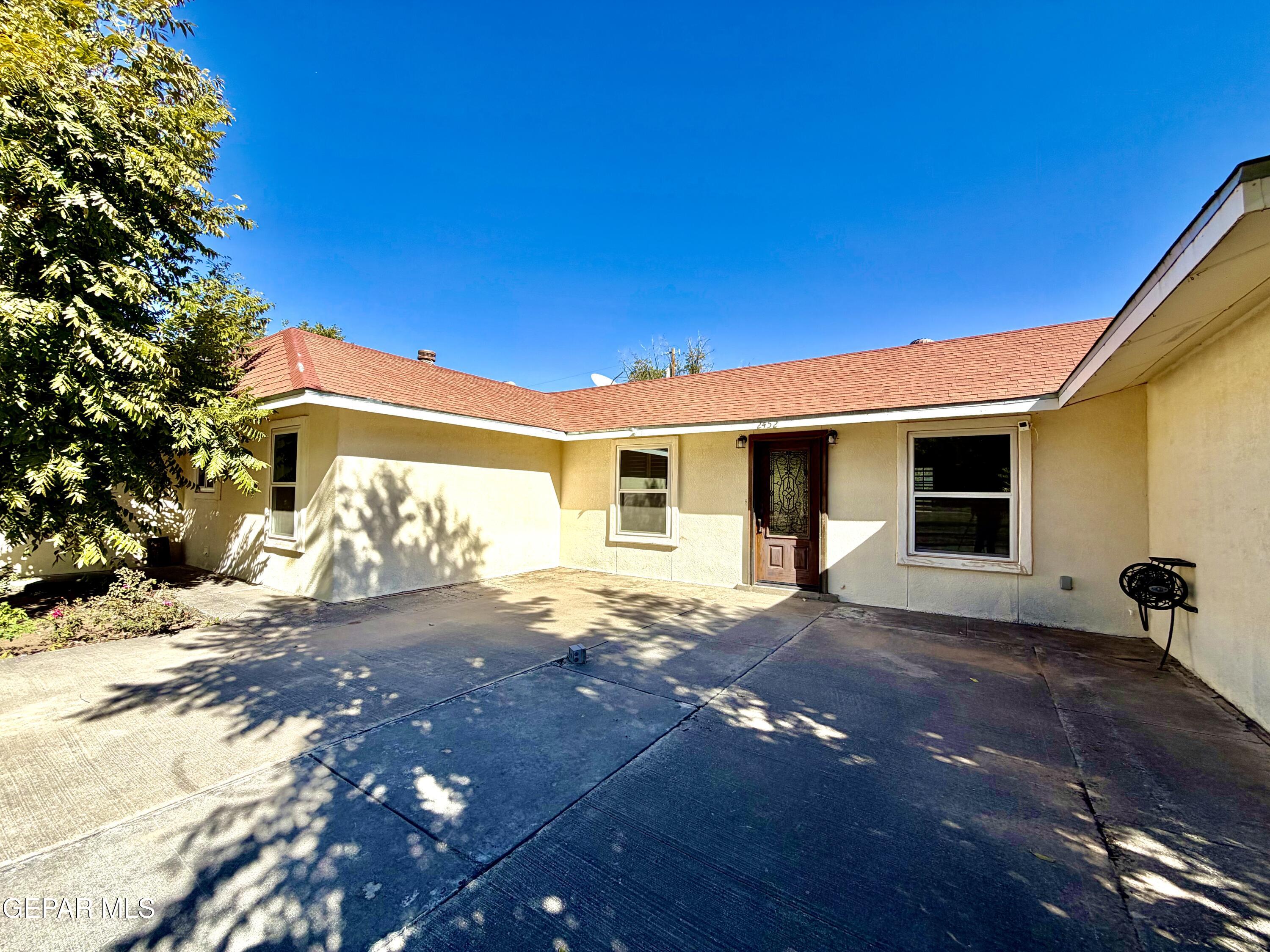 2452 West Ohara Road Anthony, NM 88021 - Photo 2 of 56 a view of a house with a patio