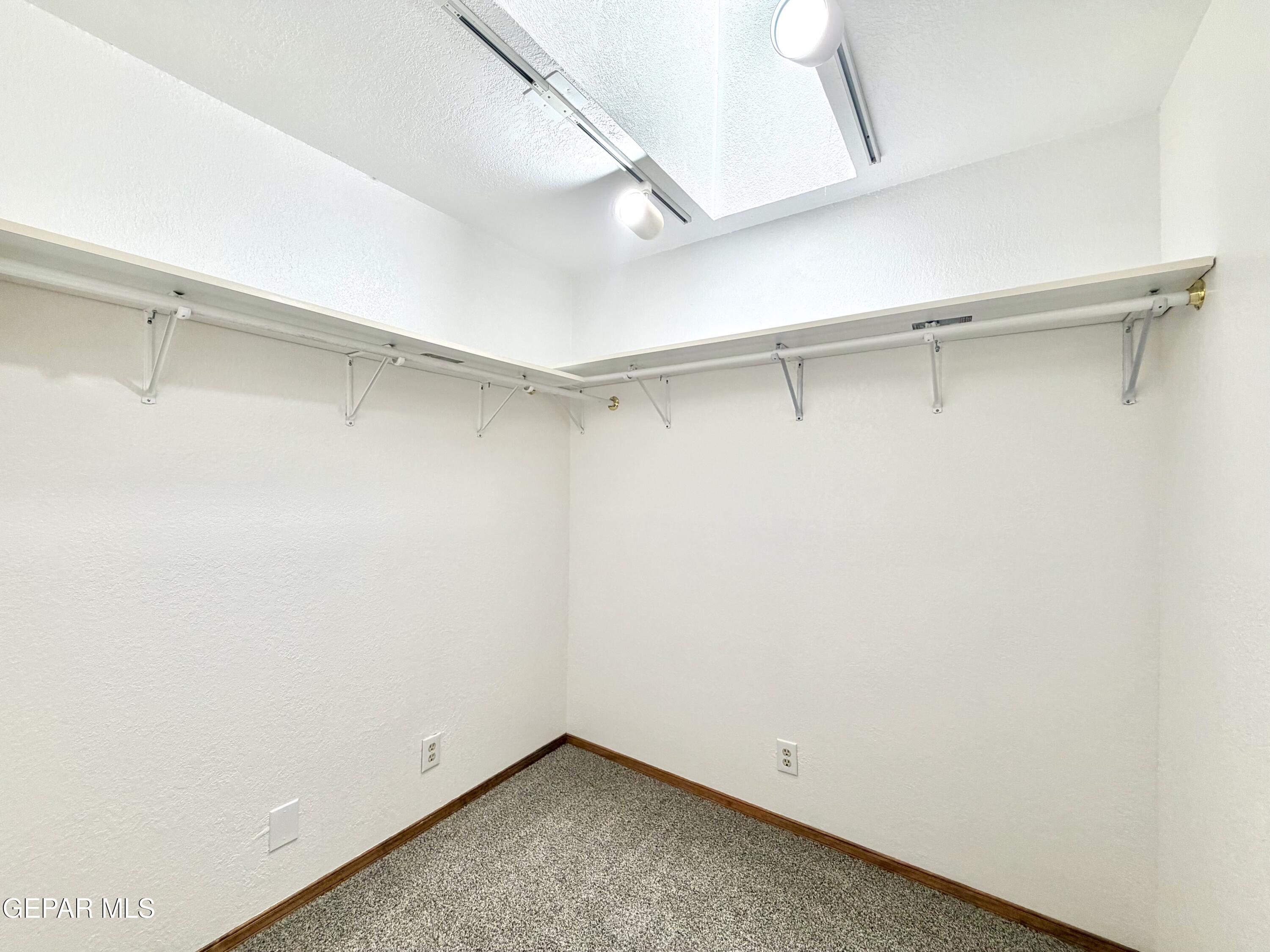 2452 West Ohara Road Anthony, NM 88021 - Photo 22 of 56 a view of an empty walk in closet