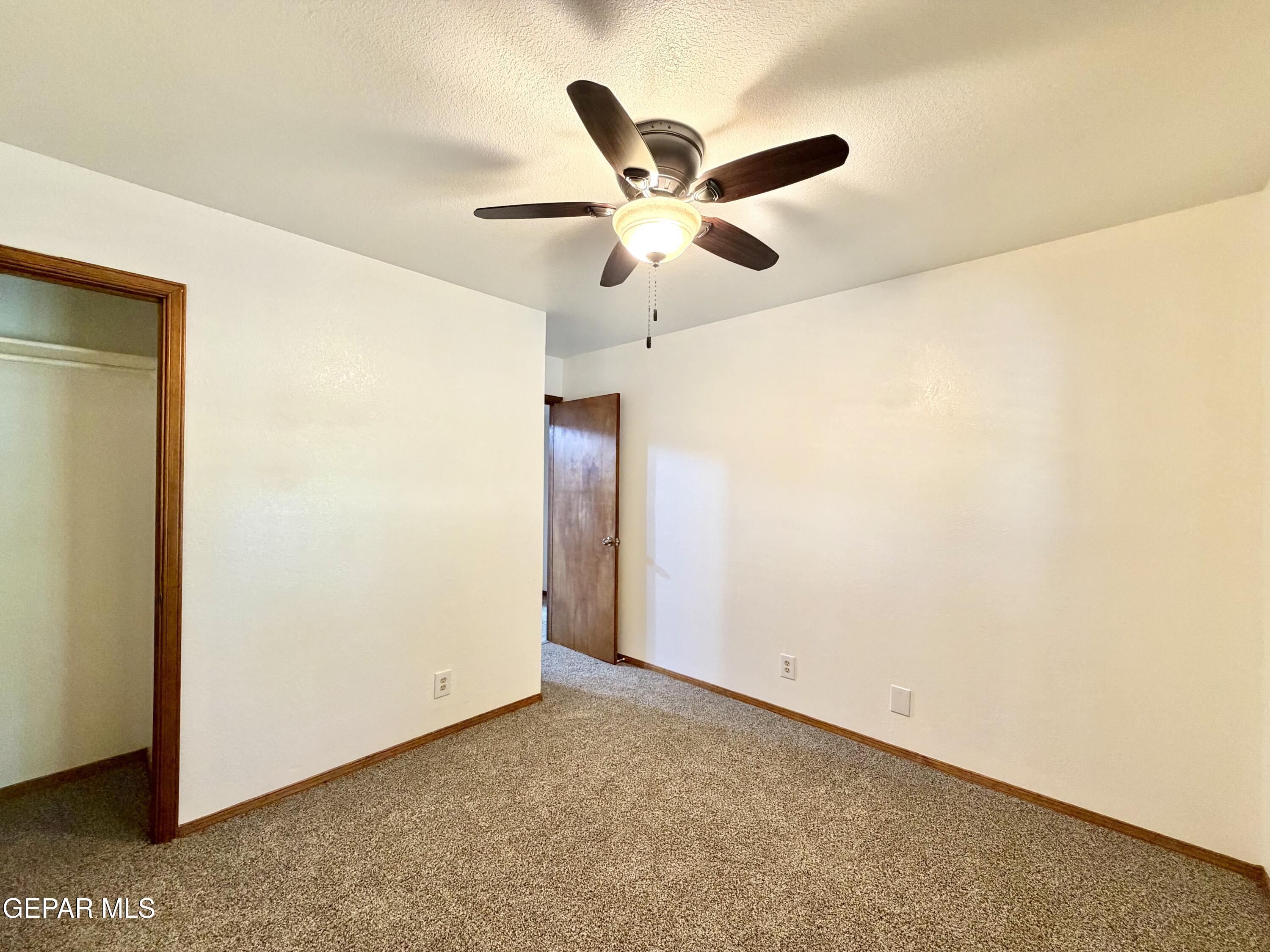 2452 West Ohara Road Anthony, NM 88021 - Photo 24 of 56 a view of a big room with carpet