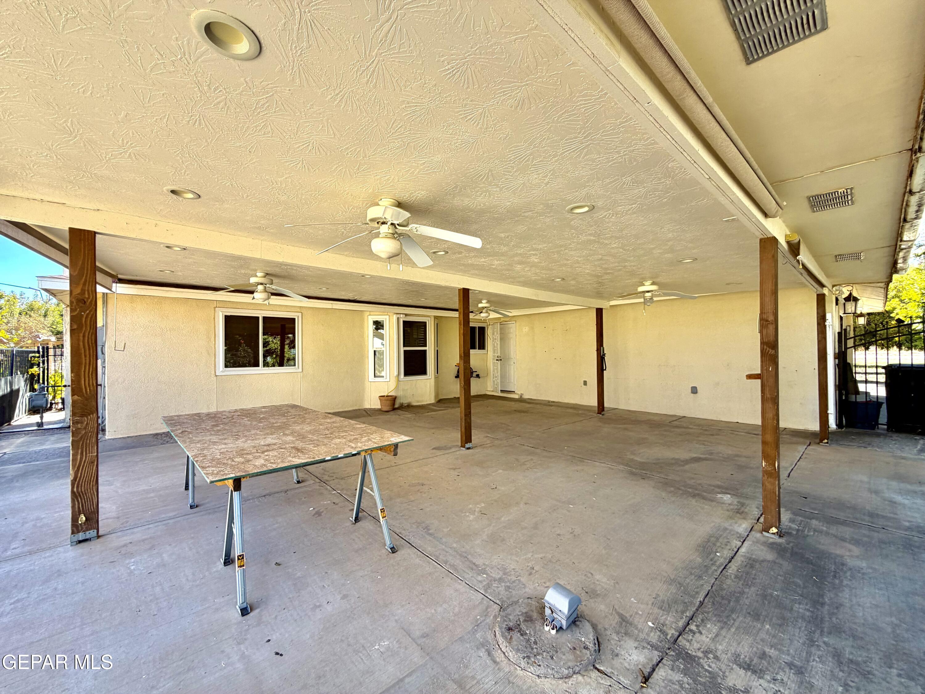 2452 West Ohara Road Anthony, NM 88021 - Photo 32 of 56 a balcony with table and chairs