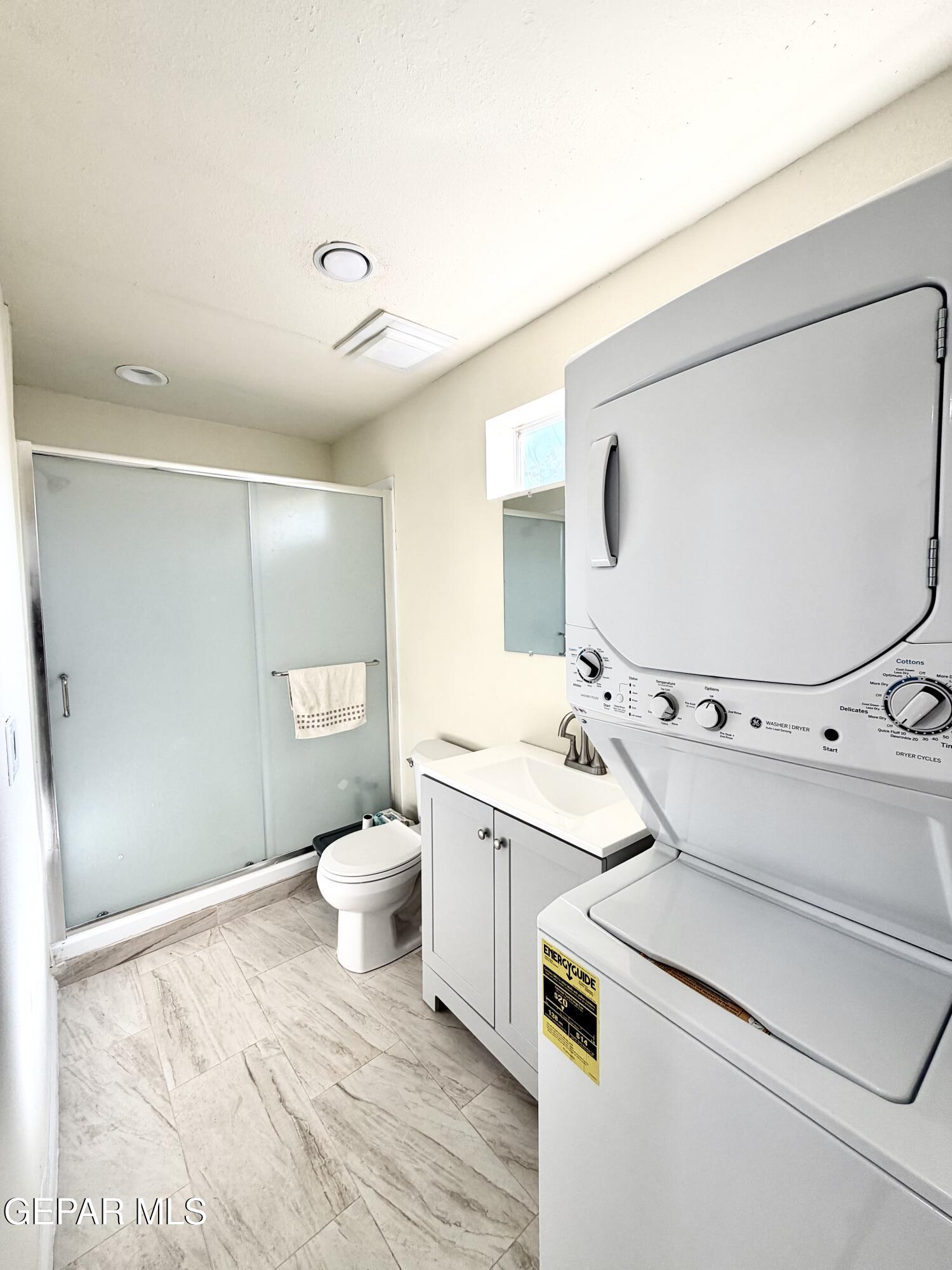2452 West Ohara Road Anthony, NM 88021 - Photo 41 of 56 a bathroom with a toilet sink and mirror