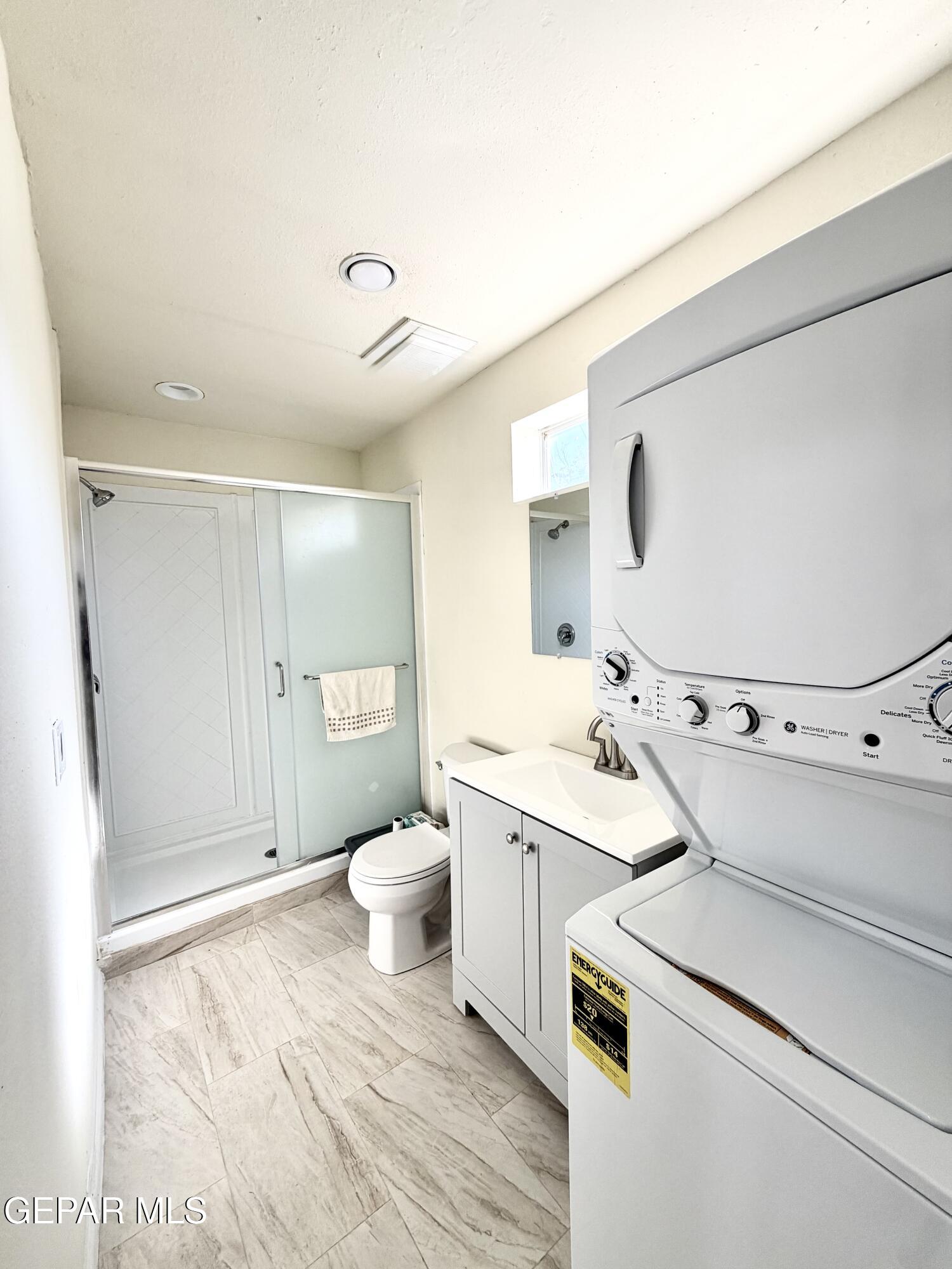 2452 West Ohara Road Anthony, NM 88021 - Photo 42 of 56 a bathroom with a sink a toilet and a mirror