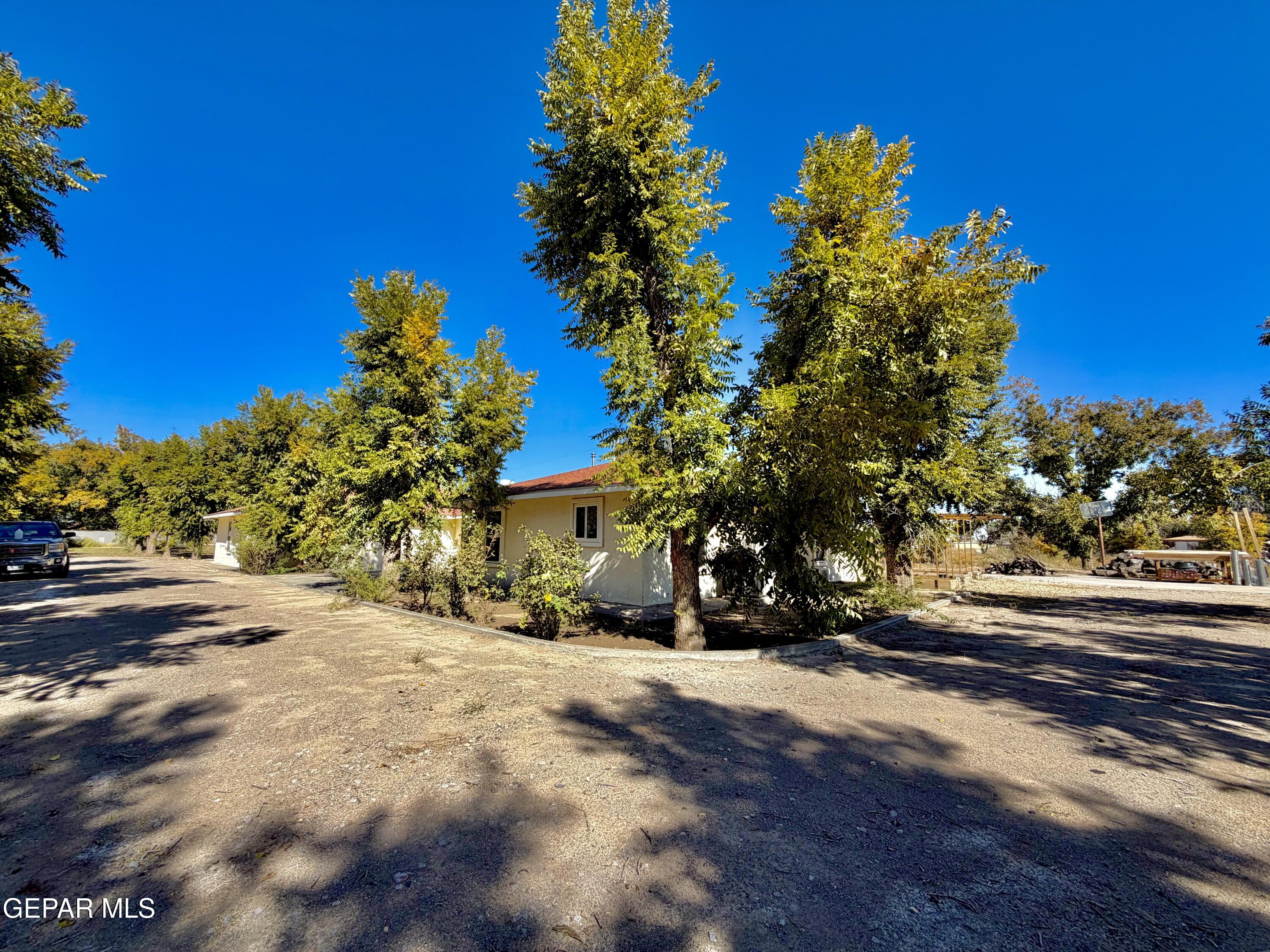 2452 West Ohara Road Anthony, NM 88021 - Photo 7 of 56 a view of a street with a building in the background