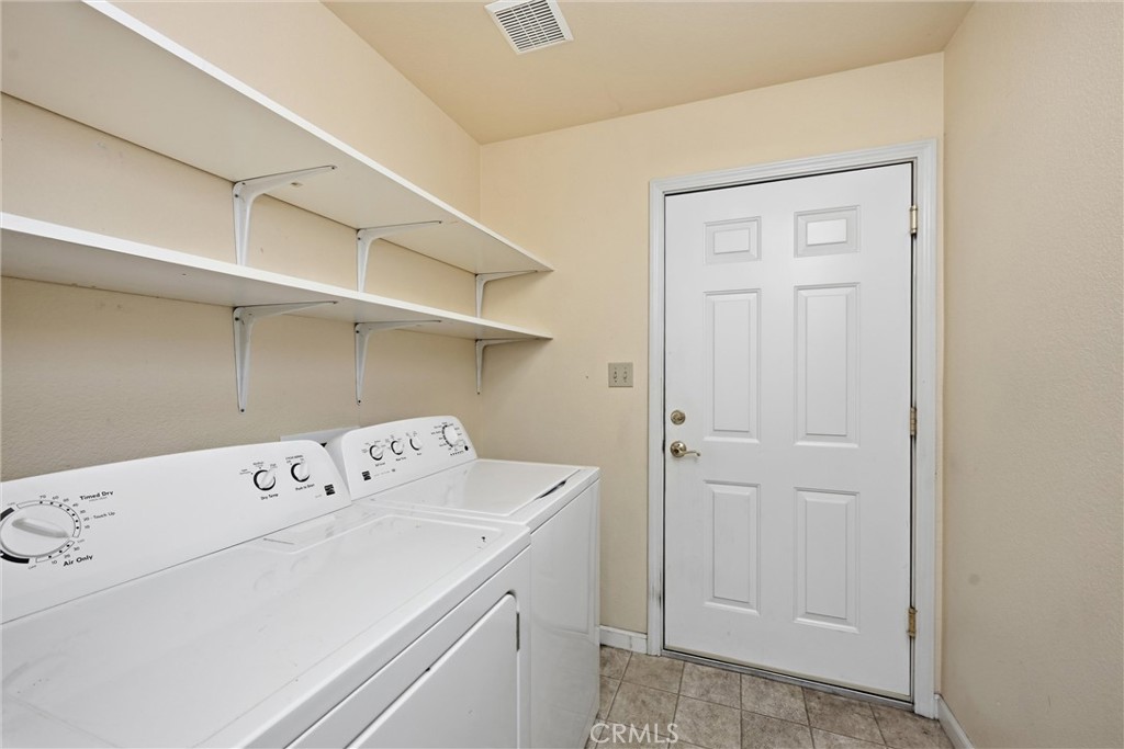18846 Horseshoe Road Hidden Valley Lake, CA 95467 - Photo 20 of 31 a utility room with dryer and washer